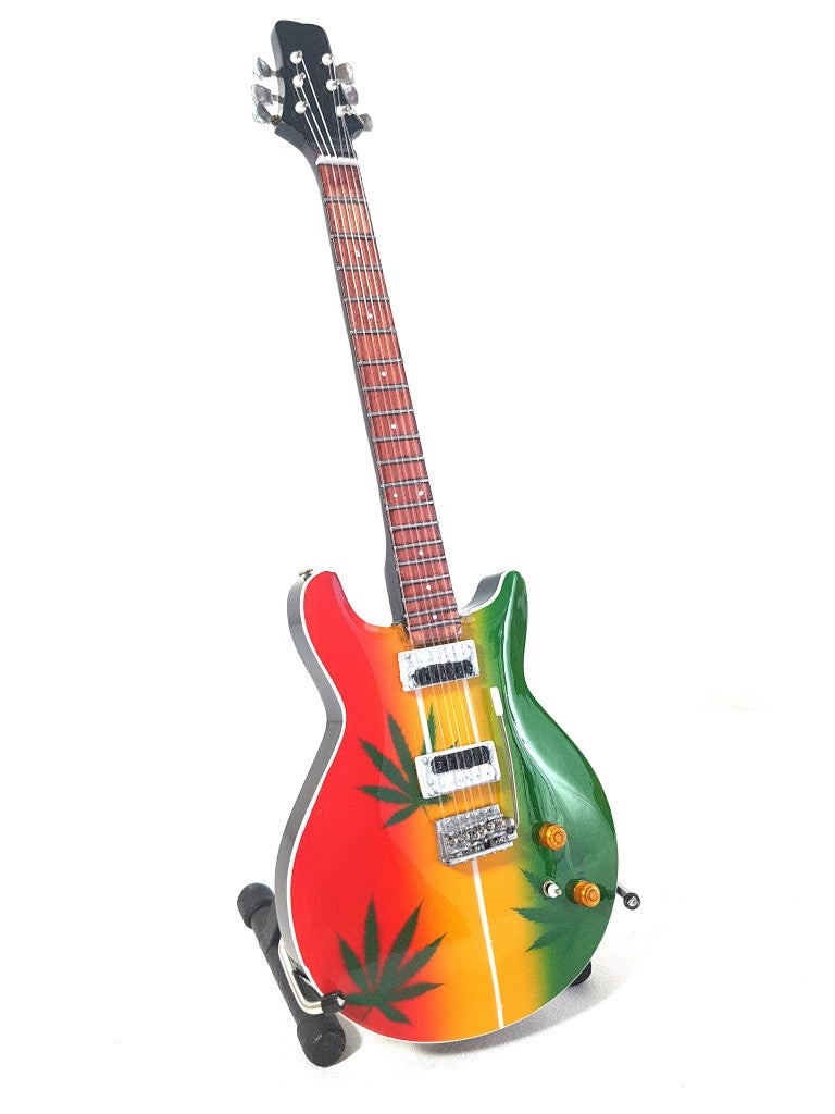 Mini-Gitarre Bob Marley Tribute Ganja MGT-0468 mit Möglichkeit zur personalisierten Gravur, ideales Geschenk für Reggae-Fans, handgefertigt aus Mahagoniholz, Höhe 27,5 cm, Farbe Gelb, Rot, Grün, Weiß