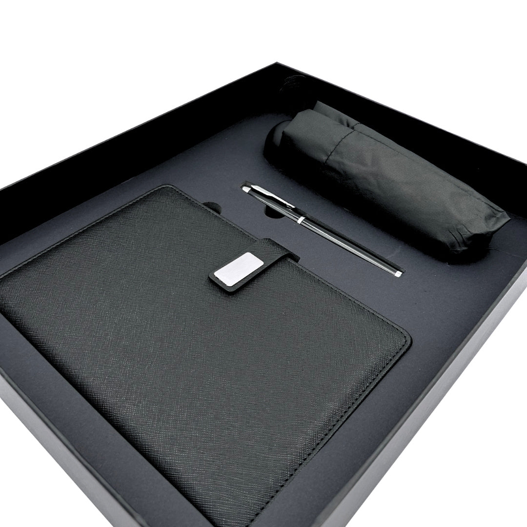 Elegantes Geschenkset mit Personalisierung - Leder-Notizbuch A5, Kugelschreiber und schwarzer Regenschirm in Geschenkbox