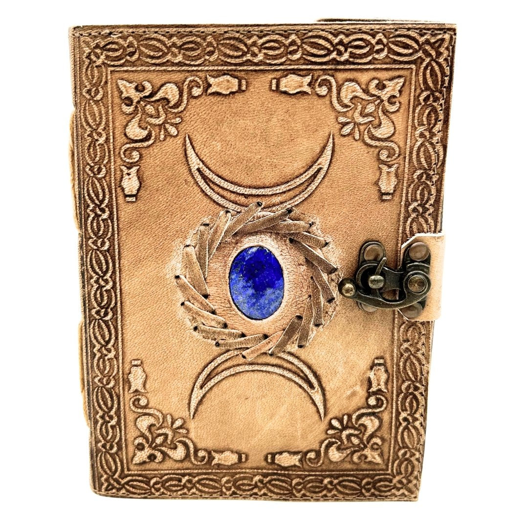 Retro-Ledernotizbuch mit Stein und Mondphasen