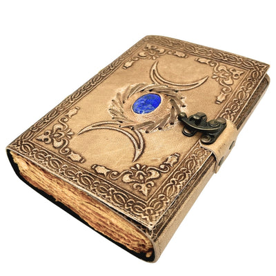 Retro-Ledernotizbuch mit Stein und Mondphasen