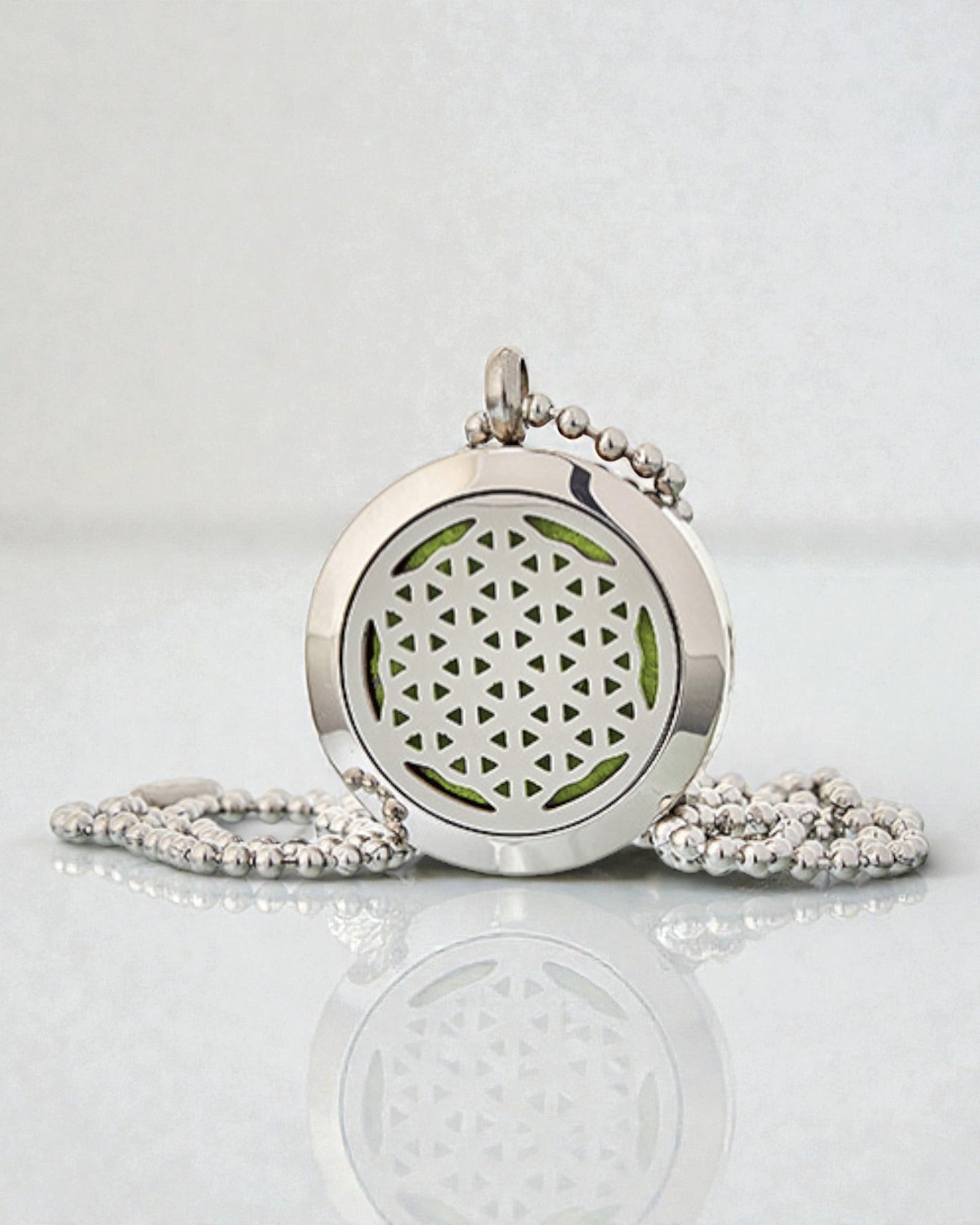 Aurelia Vita – Aromaterapeutyczny Naszyjnik Dyfuzor Kwiat Życia 25 mm ze Stali Nierdzewnej