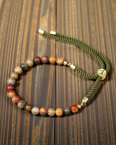 Moss Aura – Armband mit Picasso-Jaspis und 18K Gold an grüner Kordel