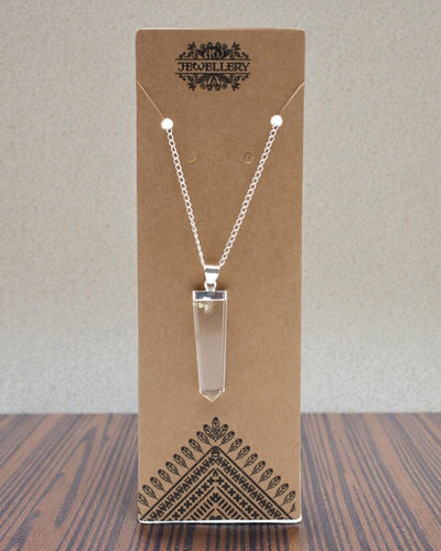 Kristallstrahl – Flacher Anhänger aus Bergkristall im Kristallschliff