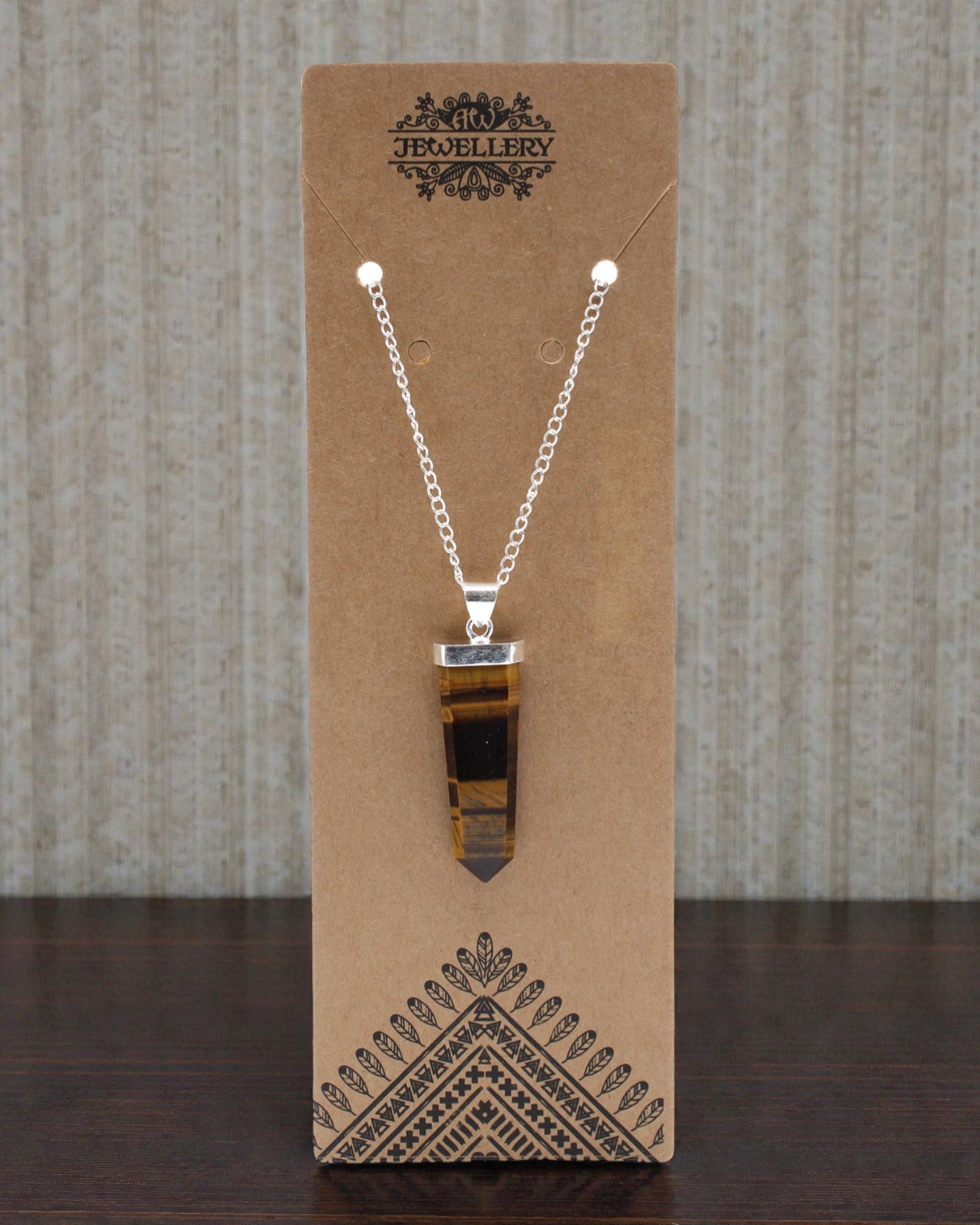 Tigerflamme – Flacher Anhänger aus Tigerauge im Kristallschliff