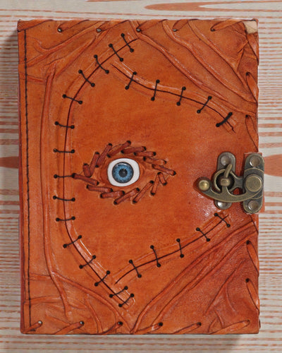 Solarius Schutz – Leder-Notizbuch mit „Böser-Blick“-Motiv und handgenähten Nähten